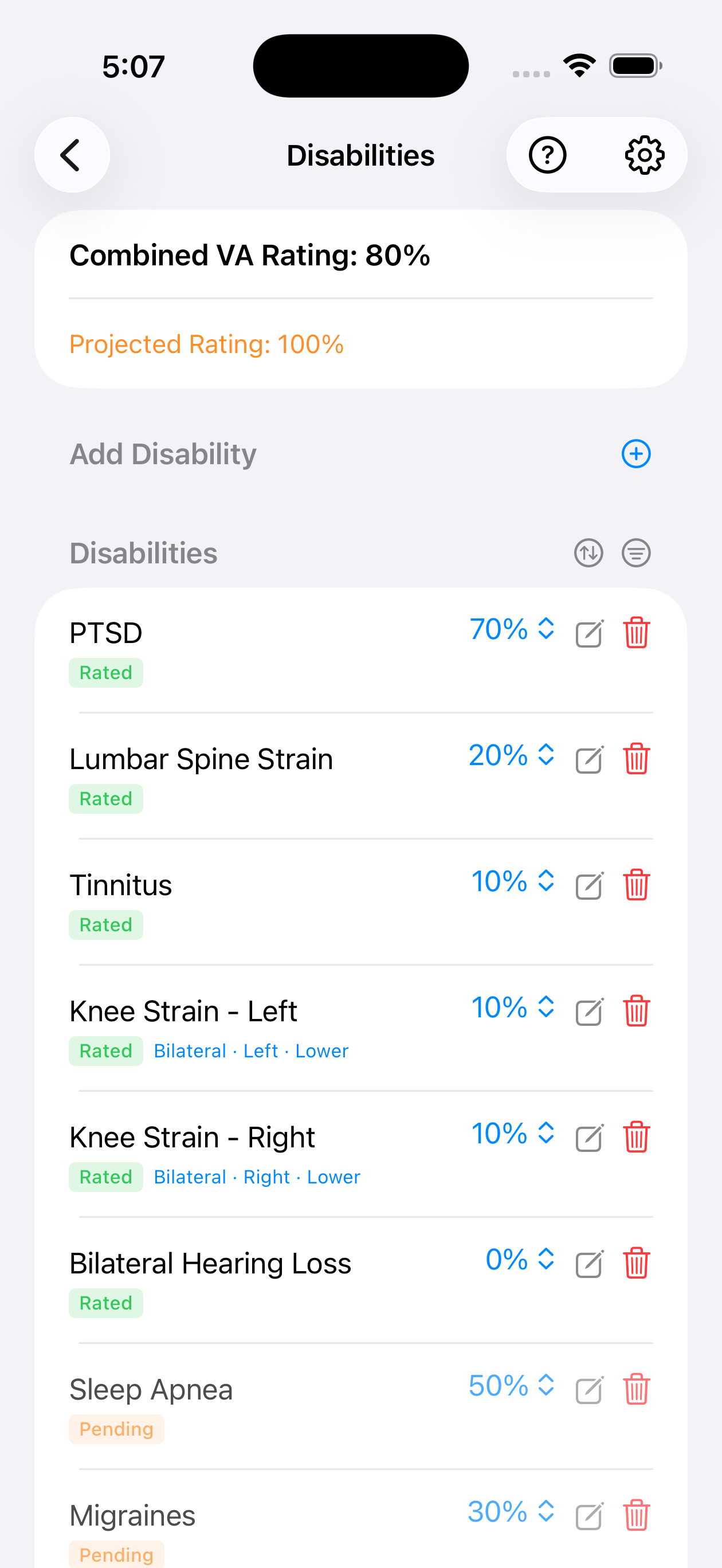Disabilities list with mixed Rated, Pending, and Denied statuses including bilateral knee and hearing loss conditions